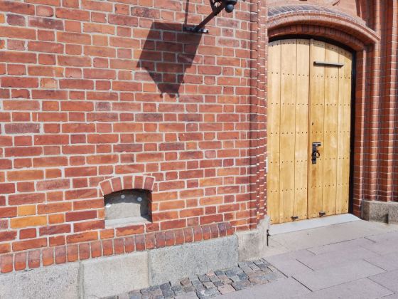 Bronze age stone in Vor Frue church, Svendborg (Cup Marked Stone)